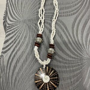 Very unique necklace in white never worn